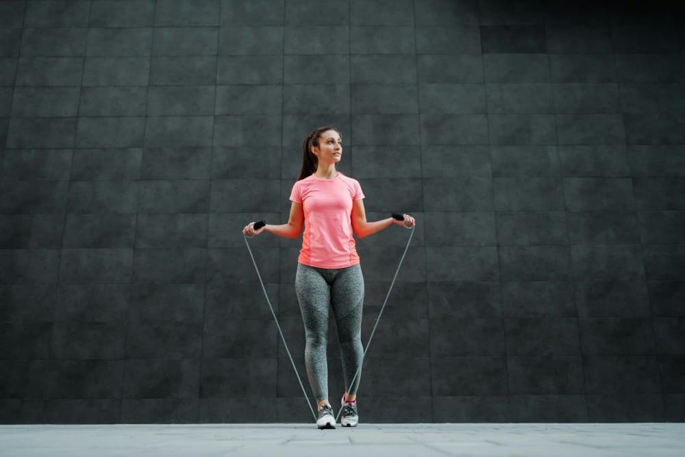 Corde à sauter femme en exercices
